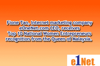 Fione Tan receiving Entrepreneur Award from Queen of Malaysia